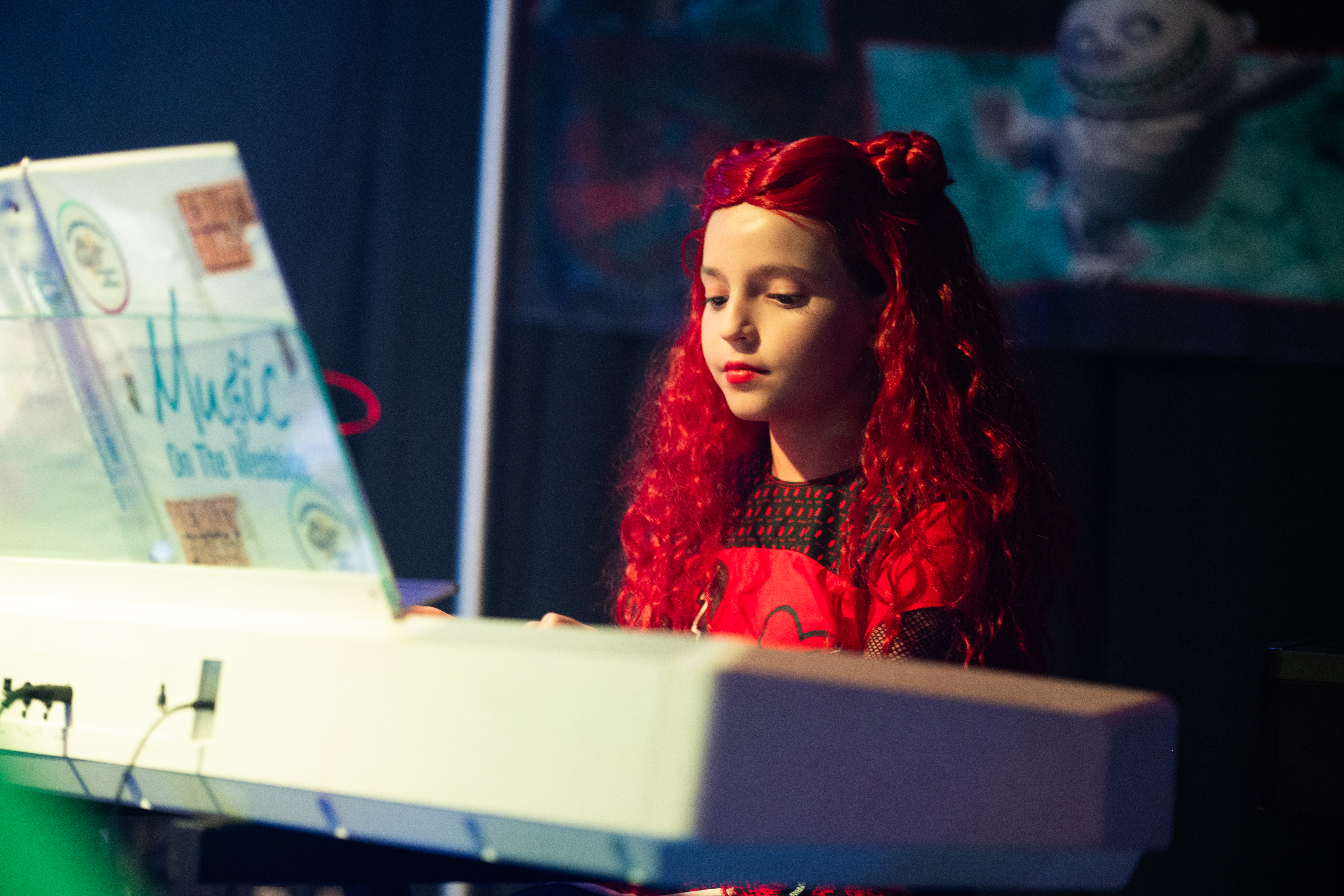 Piano student performing at MOTW Halloween concert